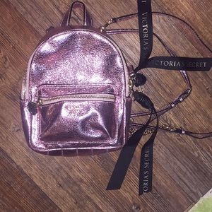 Like new Victoria’s Secret rose gold mini backpack